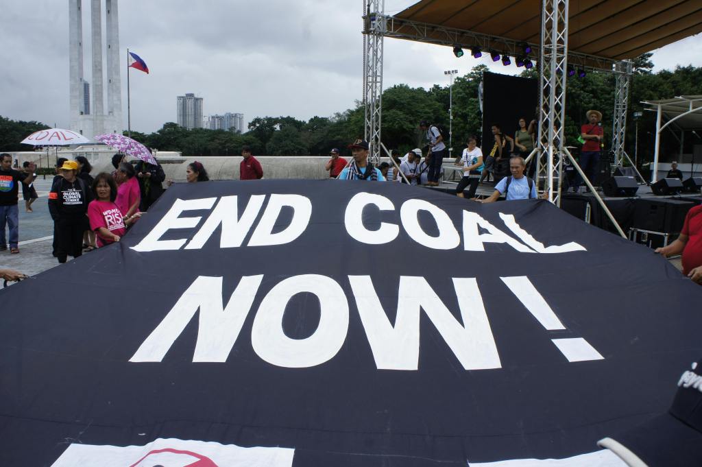 ‘End Coal Now!’ sign at a climate action rally in the Philippines.
